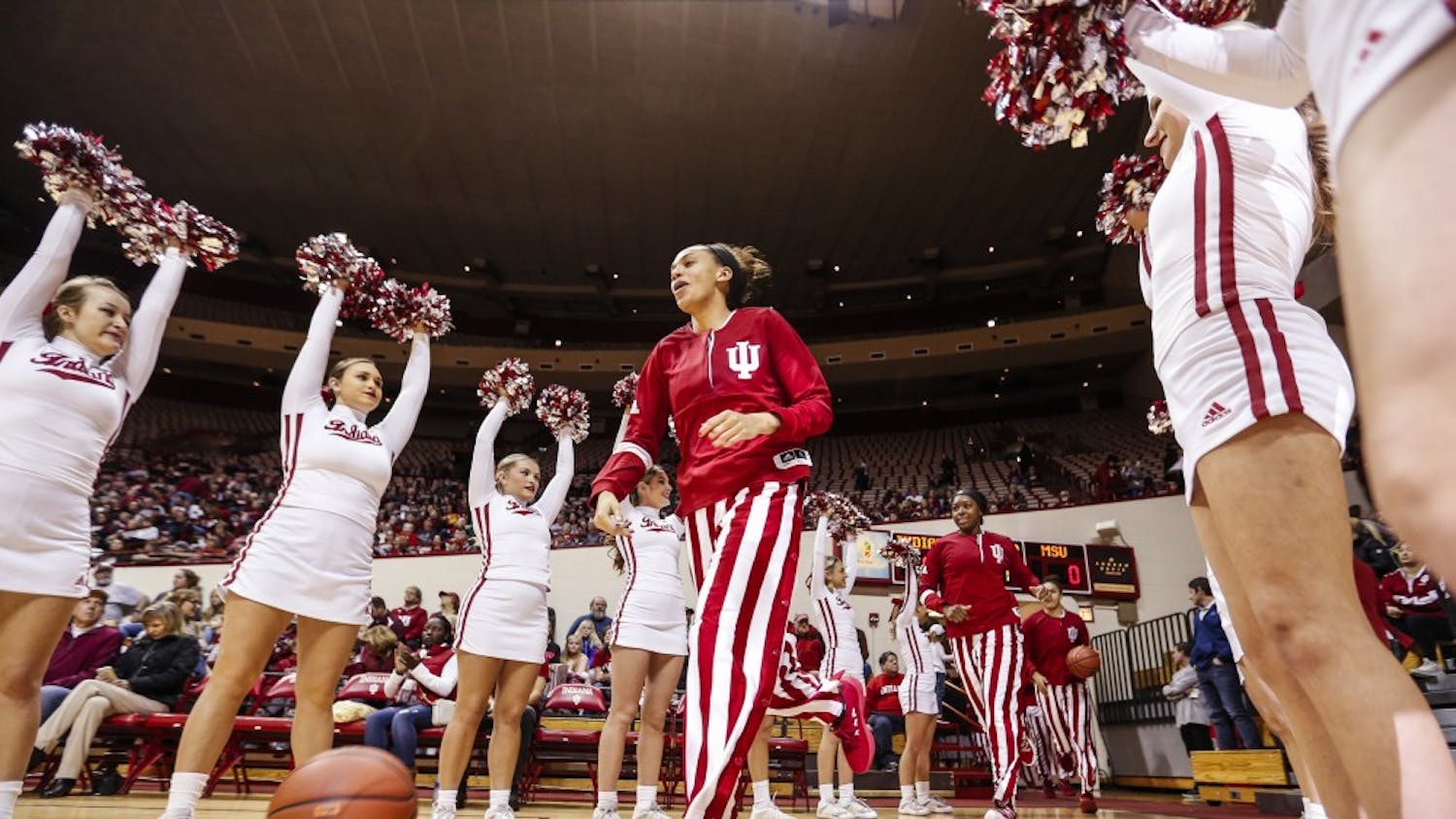 IU runs onto the court at the beginning of the Hoosiers' game against the Michigan State Spartans on Dec. 28 at Simon Skjodt Assembly Hall. IU plays Northwestern on Sunday afternoon.