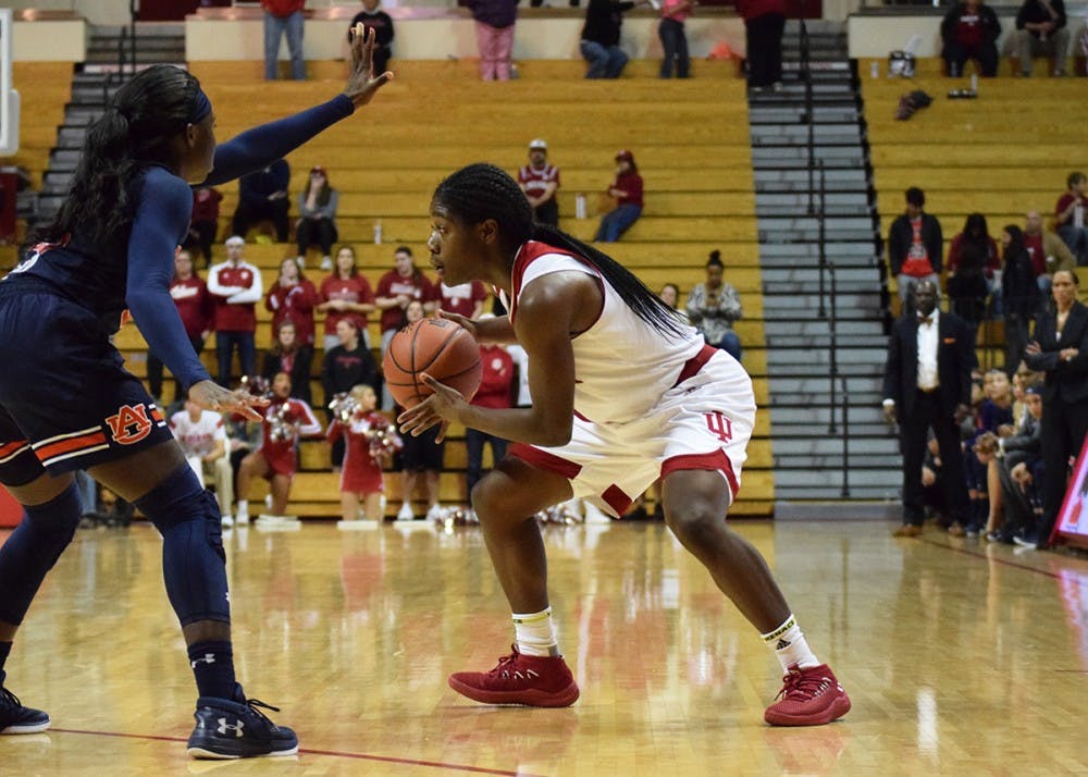 Freshman guard Bendu Yeaney looks for a chance to pass the ball to one of her teammates near the end of the game against Auburn on Sunday. IU lost, 65-53, at Simon Skjodt Assembly Hall.