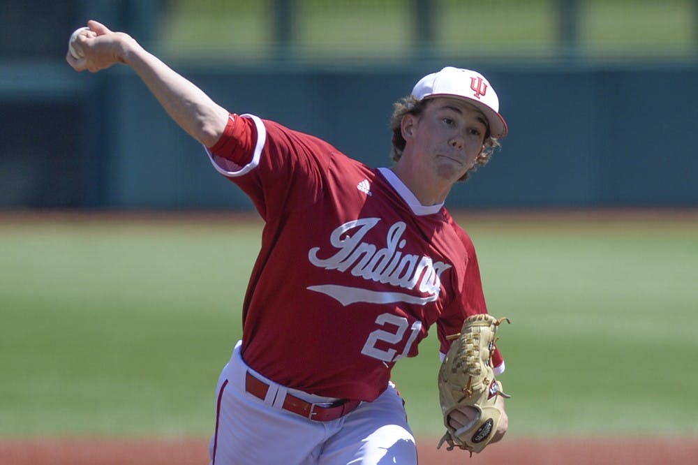 Junior pitcher Christian Morris delivers a pitch during IU's game against Rutgers on Sunday at Bart Kaufman Field. Junior Scott Effross was expected to start the game but was replaced by Morris due to numbness in his arm.