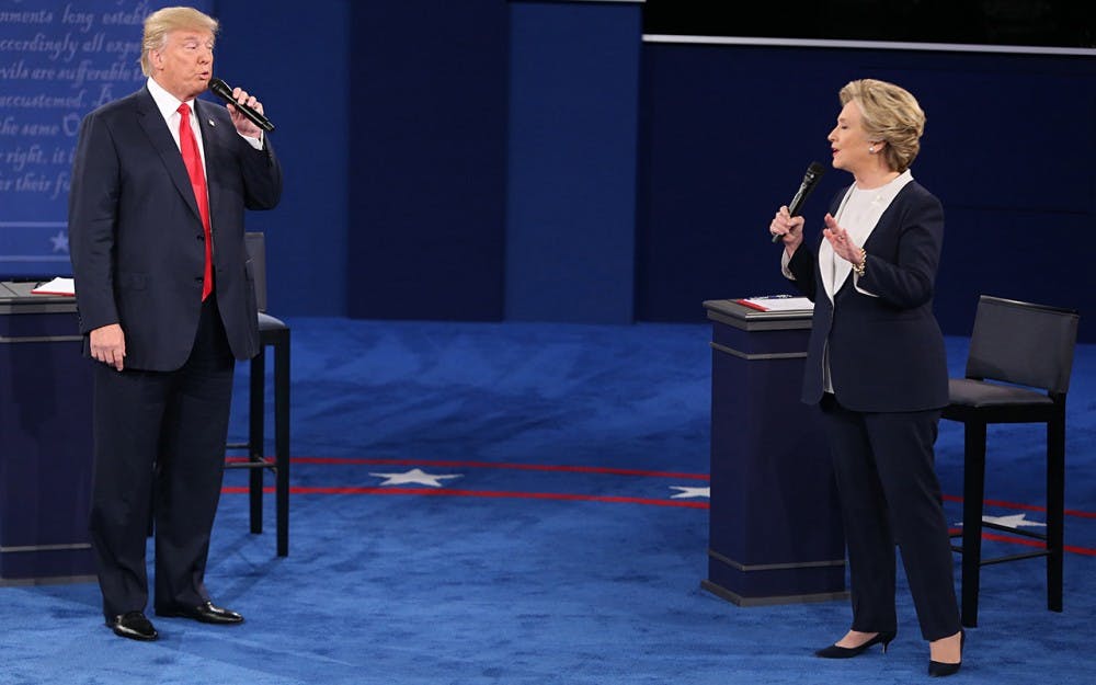 Donald Trump and and Hillary Clinton on stage during the second debate between the Republican and Democratic presidential candidates on Sunday, Oct. 9, 2016 at Washington University in St. Louis, Mo. (Christian Gooden/St. Louis Post-Dispatch/TNS)
