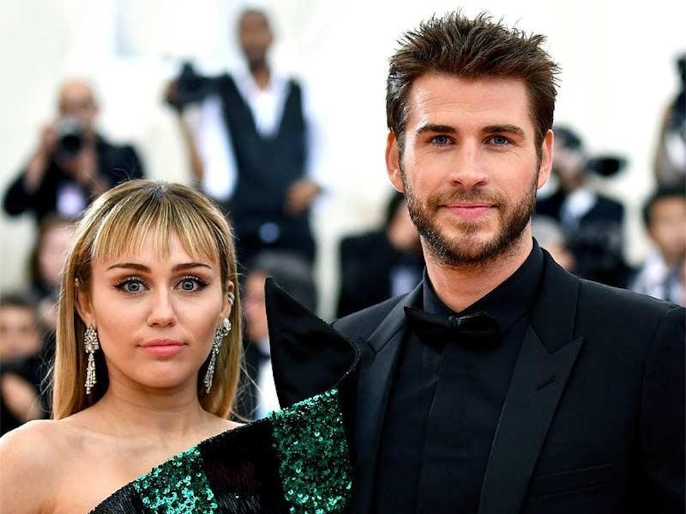 Miley Cyrus and Liam Hemsworth pose in May at The Metropolitan Museum of Art&#x27;s Costume Institute benefit gala. The couple ended their marriage earlier this month.