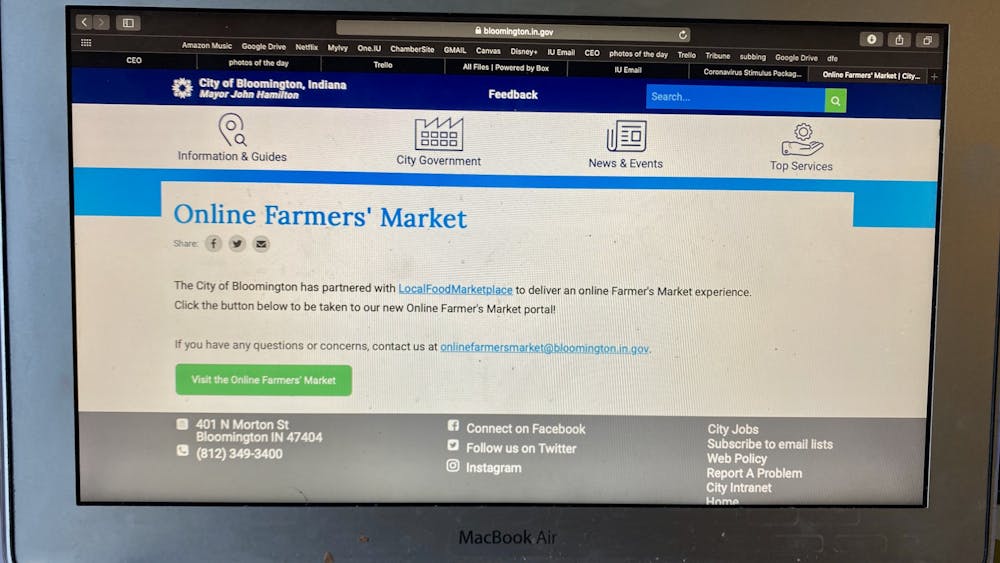 A computer with the Bloomington online farmers&#x27; market is displayed on a computer screen. According to a press release from the City of Bloomington the Bloomington farmer’s market will be online starting this week so people can buy and sell during the COVID-19 pandemic. 