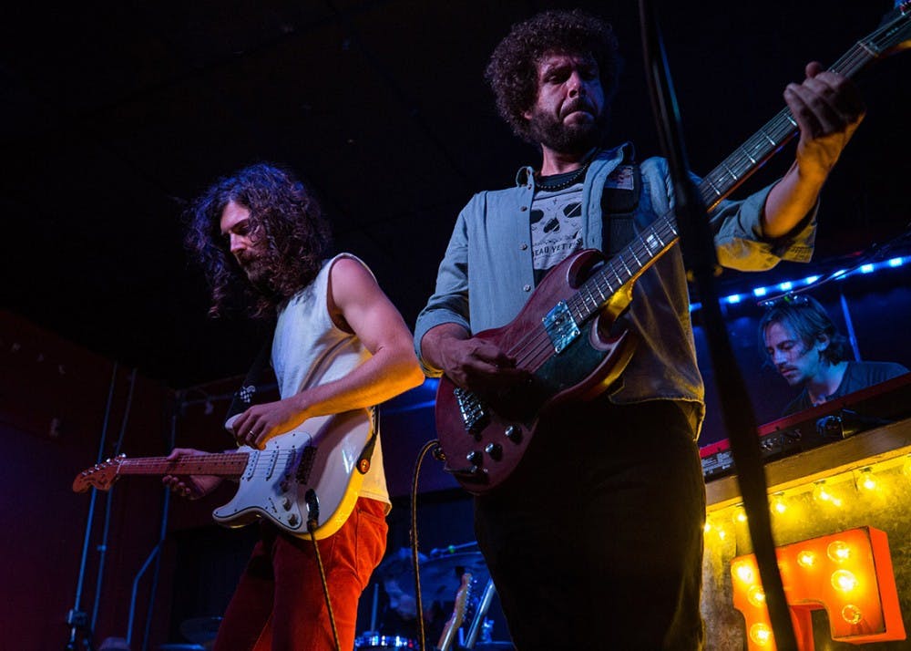<p>From left to right, guitarist Vince Dewald, bass player Brian Bakalian and pianist Elliott Peltzman perform together during The Stone Foxes show Thursday evening at the Bishop Bar.</p>
