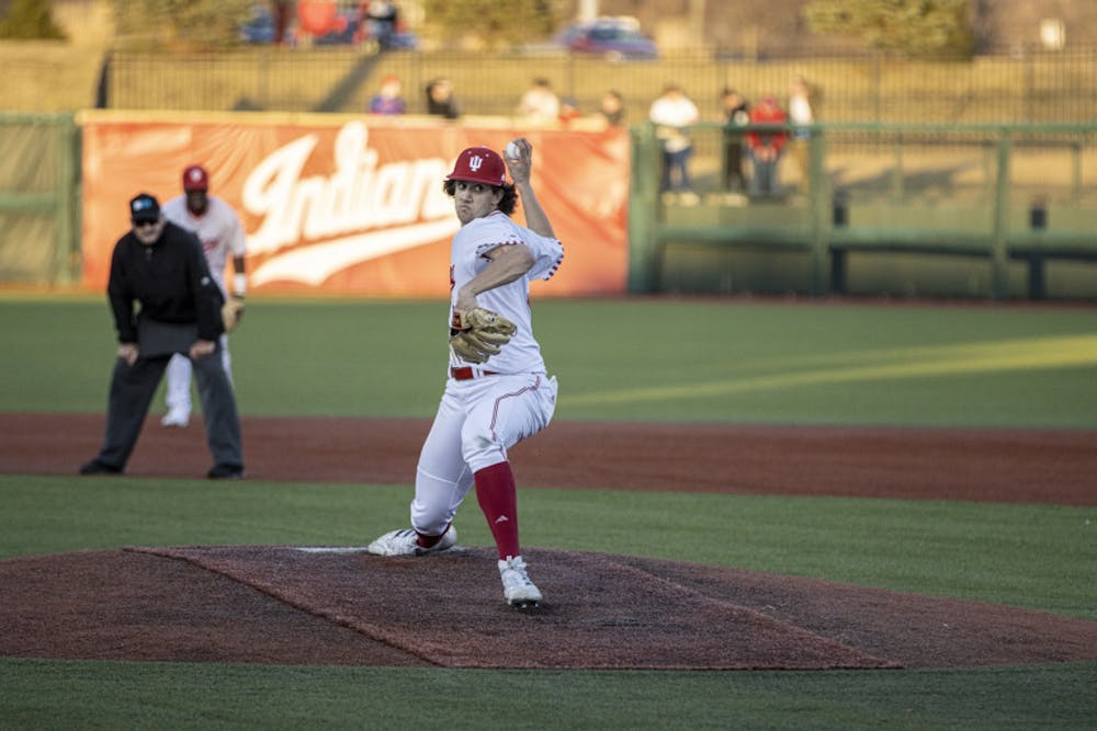 <p>Senior Braydon Tucker winds up to throw a pitch against Miami University on March 1, 2022, at Bart Kaufman Field. IU defeated Maryland 6-4 on Saturday in 11 innings.</p>