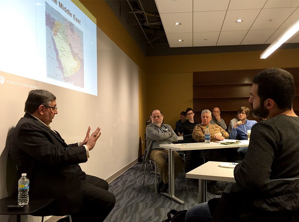 Feisal Istrabadi, left, speaks during the "States in Flux in the Middle East" lecture Wednesday at the Global and International Studies Building. Istrabadi is an IU Maurer School of Law graduate in 1988 and a formal Ambassador Extraordinary and Plenipotentiary and Deputry Permanent Representative of Iraq to the United Nations in 2004. 