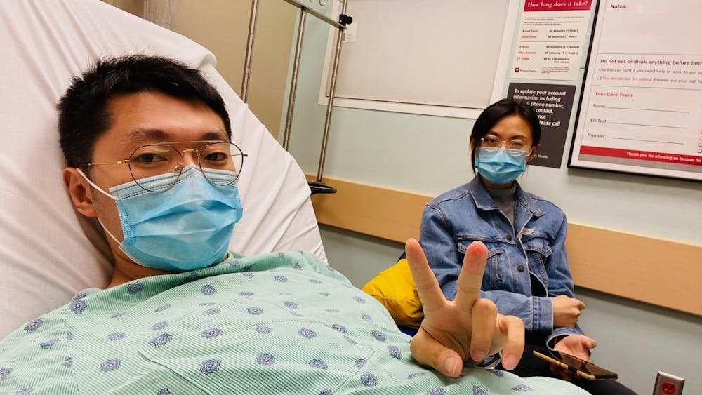 <p>Masters student Yi Jia and his wife Shiqiao Wang wait for Yi Jia&#x27;s test results Oct. 18, 2020, in the IU Health Bloomington Hospital Emergency Room. Yi Jia went to the emergency room for a fever and abdominal pain when he was diagnosed with stage four colon cancer.</p>
