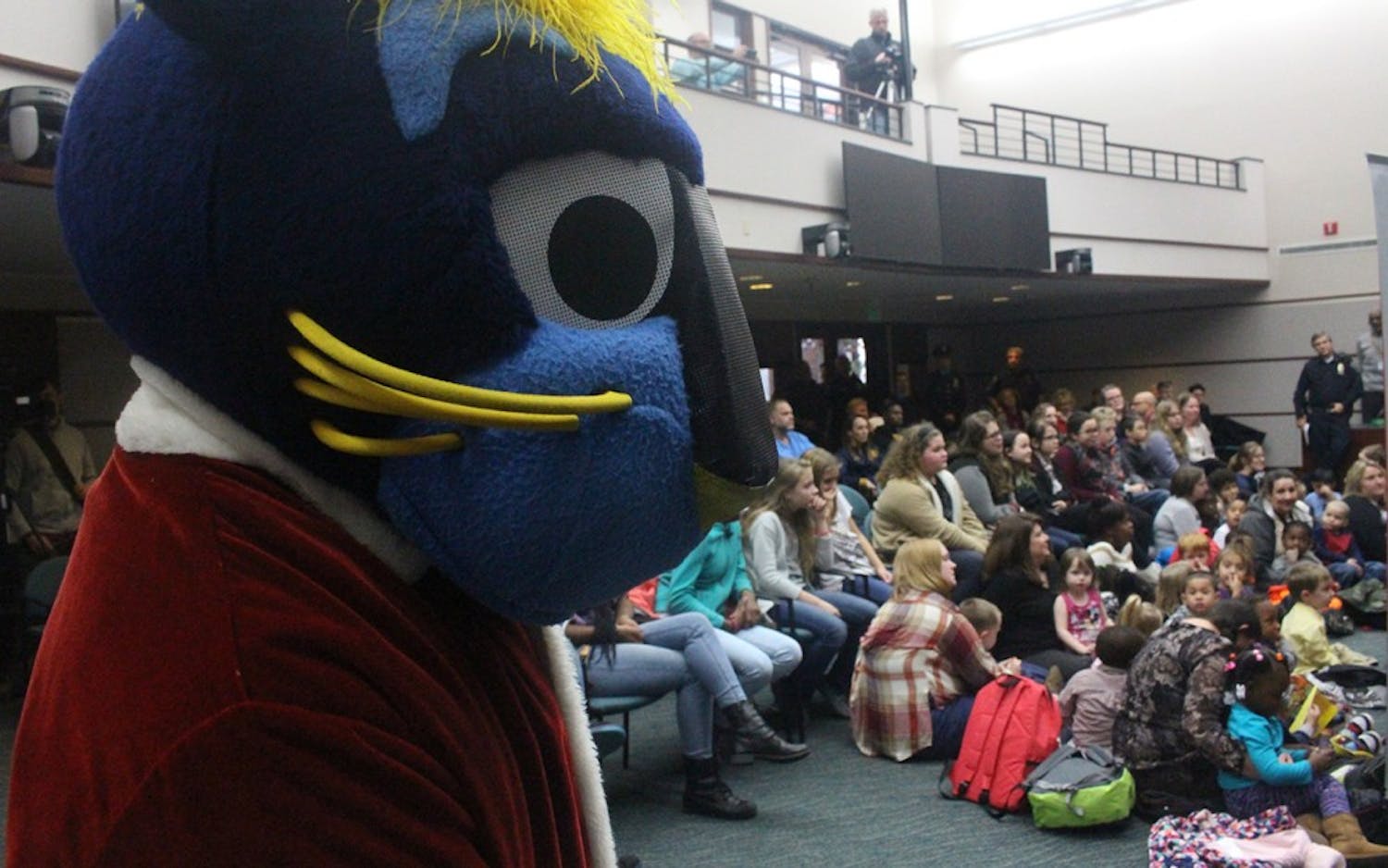 Indiana Pacers' mascot, Boomer the Panther, looks on at city hall as the Pacers hand out presents hand out presents to Bloomigton children. This event took place at 2:30 p.m. on Dec. 7.