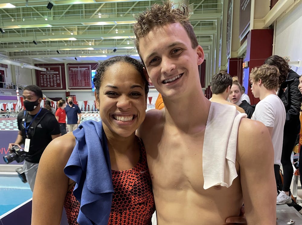 <p>Indiana divers graduate student Kristen Hayden and freshman Quinn Henninger pose for a photo Dec. 13, 2021, at Counsilman-Billingsley Aquatics Center. On Monday, Hayden became the first Black woman to win a national championship for USA Diving. </p>