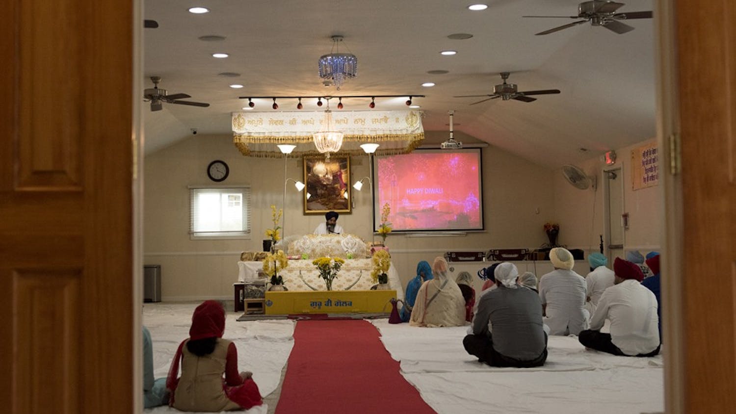 Sikhism practitioners in Fishers, Ind. attending a weekly religious ceremony where words from the Guru Granth Sahib are read. The Holy Book contains passages from the Quran and from the Old Testament. 