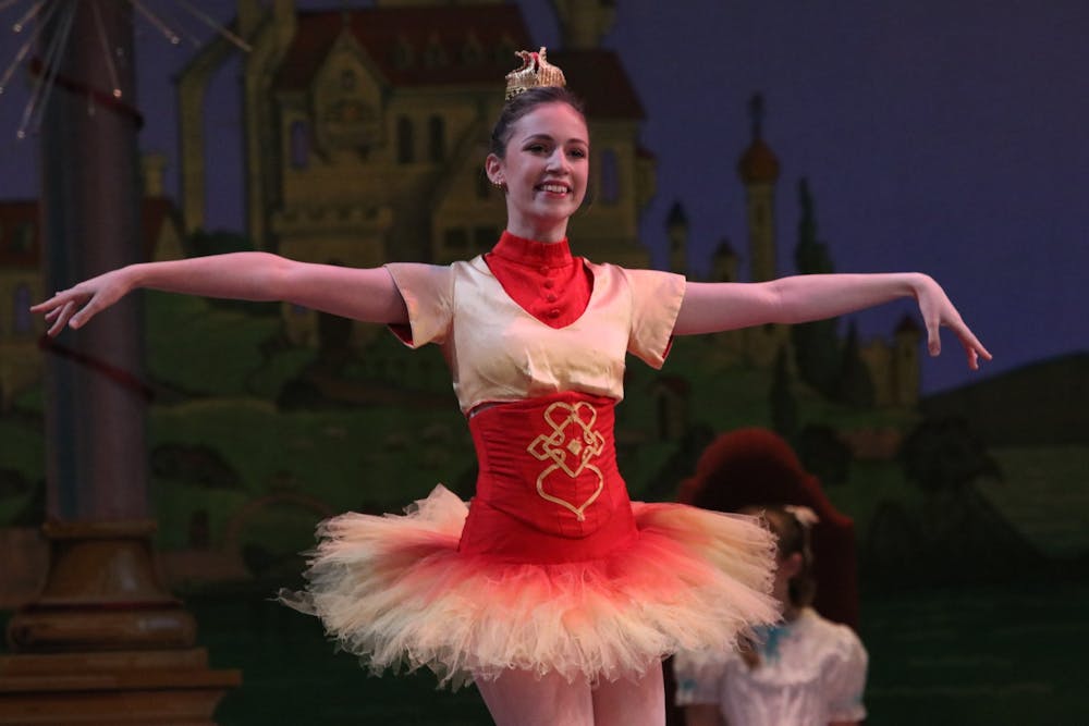 <p>An IU ballet major dances during a dress rehearsal Nov. 29, 2021, in the Musical Arts Center. IU Ballet presented its annual production of “The Nutcracker” this weekend.</p><p></p>