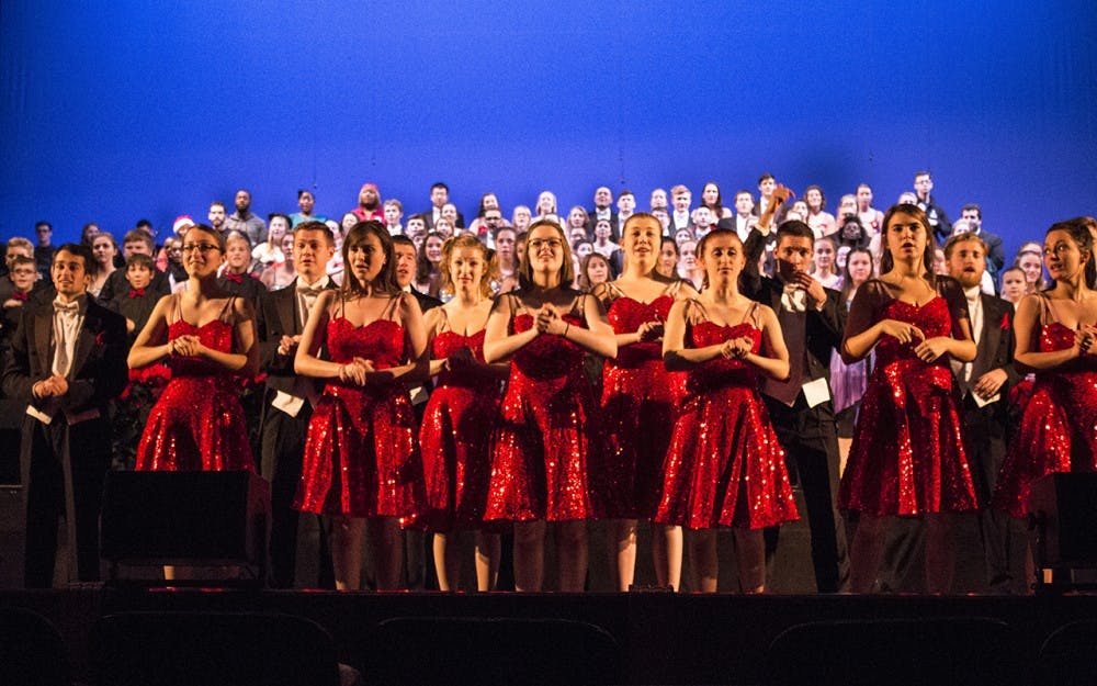 Members of the Singing Hoosiers rehearse for their Chimes of Christmas performance Dec. 3, 2015, at the IU Auditorium. The Grammy-nominated Singing Hoosiers will present “Chimes of Christmas” at 2 and 7:30 p.m. Dec. 1 at the IU Auditorium.&nbsp;