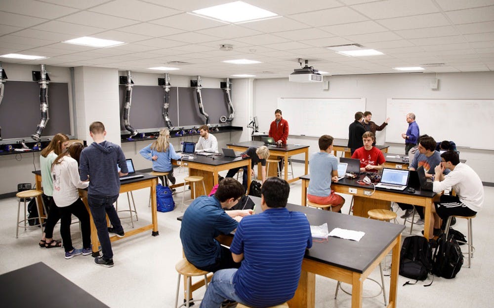 Students work in small, collaborative groups during an intelligent systems engineering class taught by Professor Martin Swany. The inaugural class is only 18 students but those in the class say that is an advantage for them.