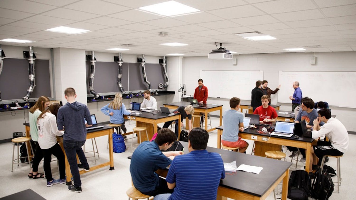 Students work in small, collaborative groups during an intelligent systems engineering class taught by Professor Martin Swany. The inaugural class is only 18 students but those in the class say that is an advantage for them.
