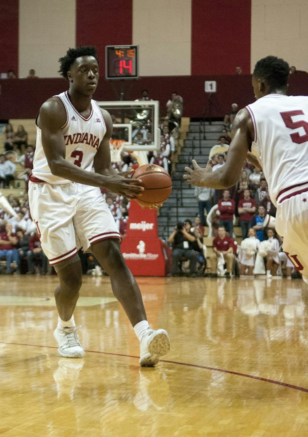 Freshman forward O.G. Anunoby (3) passes the ball to sophomore Troy Williams (5) during the game against Bellarmine on Monday evening at Assembly Hall. The Hoosiers won, 73-62.