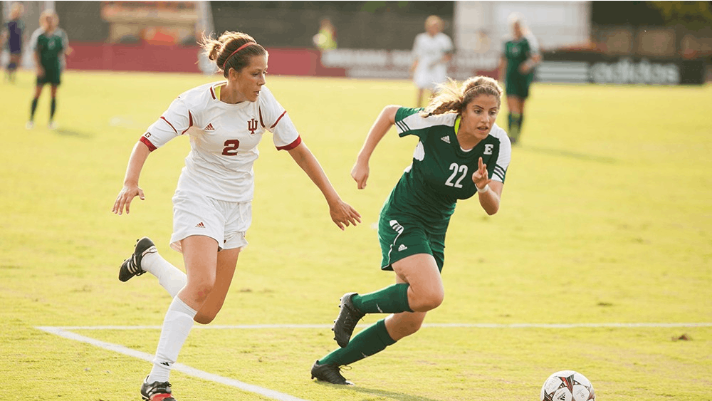 Then-sophomore Midfielder Jessie Bujouves chases after a ball during IU's game against Eastern Michigan on Sept. 6, 2013 at Bill Armstrong Stadium.