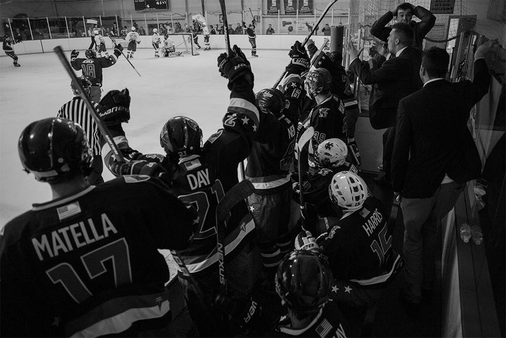 Beta Theta Pi players celebrate after scoring a goal against Sigma Chi during the 6th annual Drop the Puck on Cancer event Saturday night at Frank Southern Ice Arena. Beta beat Sigma Chi 6-1. Drop the Puck on Cancer was originally started in 2011 by the fraternities Beta Theta Pi and Sigma Chi. The charity event has since grown to include over ten fraternities who participate in the event.