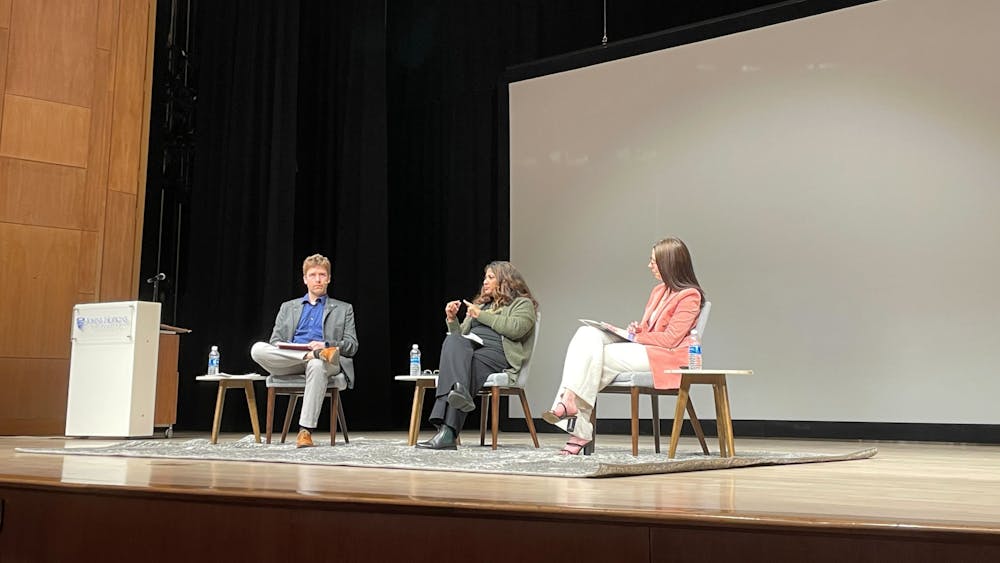 COURTESY OF CATHY WANG
Tower and Brown took opposing sides in whether climate change will cause a substantial increase in forced migration over time.