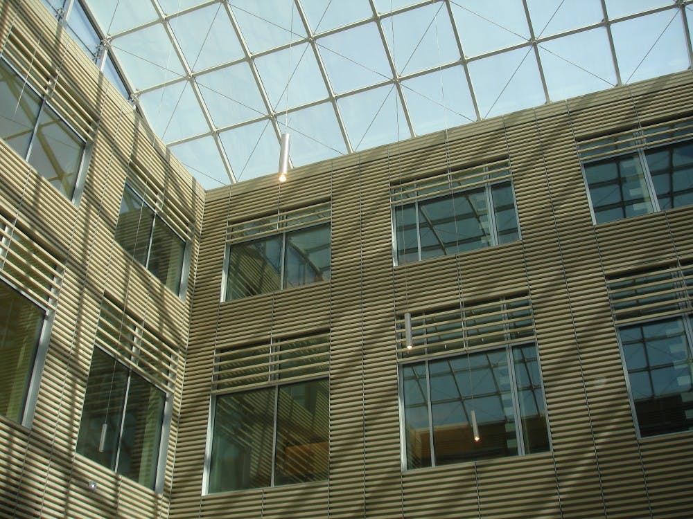A glass ceiling ensures that the atrium will be filled with natural light. Tables and chairs as well as a café will make the space an enjoyable spot for members of the Hopkins community to gather.