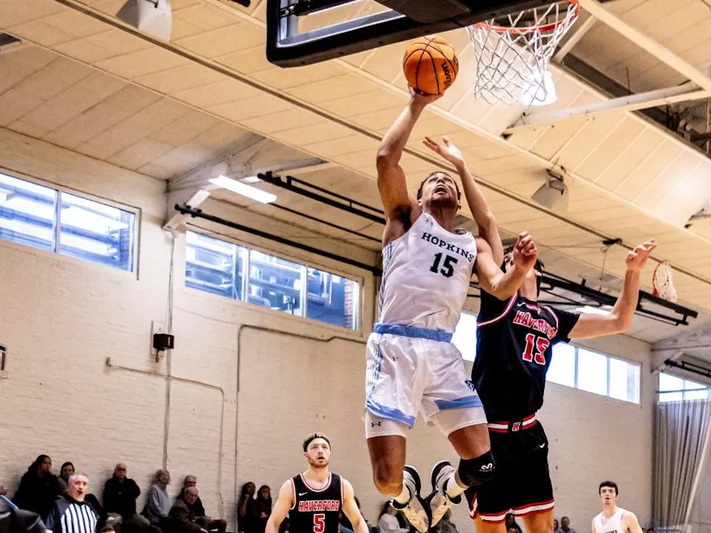 COURTESY OF HOPKINSSPORTS.COM
Men’s basketball extends their winning streak and is currently tied for the number one seed in the Centennial Conference.
