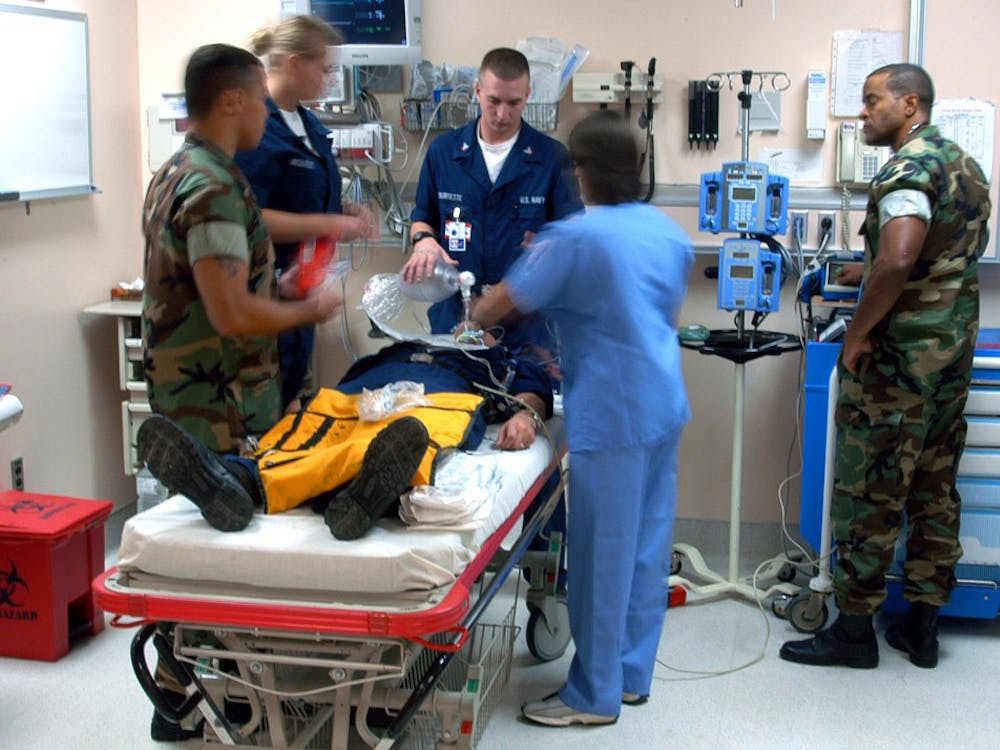 040703-N-9362D-003
Guantanamo Bay, Cuba (July 3, 2004) - U.S. Naval Hospital, Guantanamo Bay (Gitmo) staff participates in an emergency room training exercise to ensure immediate and accurate treatment during an actual casualty. U.S. Navy photo by Photographer