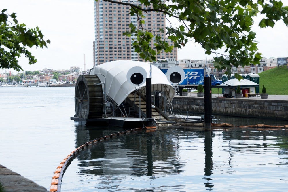Matthew Bellemare/cc-by-sa 2.0
The iconic Mr. Trash Wheel rises up out of the Inner Harbor, just across from Pier Six.