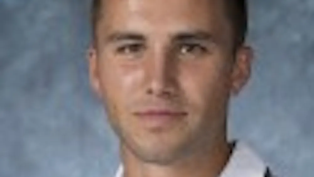 HOPKINSSPORTS.COM
Midfielder Drew Collins of M. Soccer.