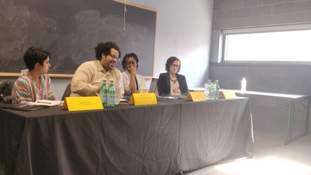 Panelists debated the pros and cons of a Hopkins private police force.