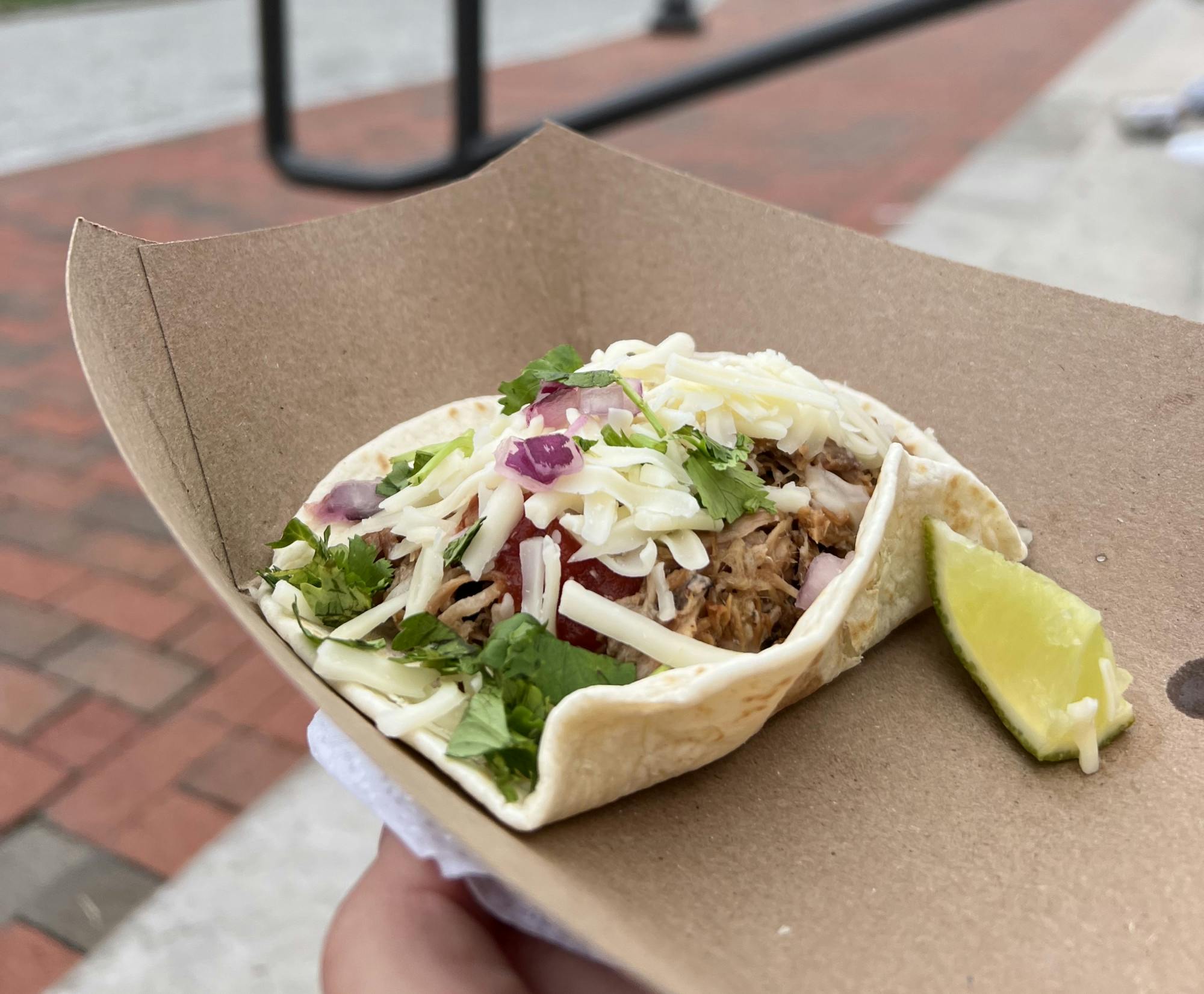 COURTESY OF KAYLA RABEY
Rabey reviews her food from the Mexican On The Run and Quinn's Ice food trucks, including the delectable carnitas pork tacos.