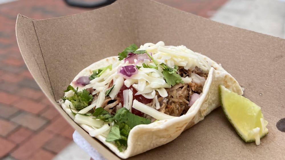 COURTESY OF KAYLA RABEY
Rabey reviews her food from the Mexican On The Run and Quinn's Ice food trucks, including the delectable carnitas pork tacos.