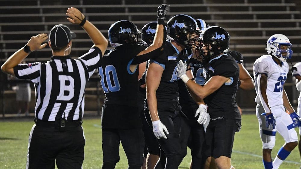 COURTESY OF HOPKINSSPORTS.COM
Hopkins football went up against Christopher Newport University in a dramatic, wire-to-wire game.