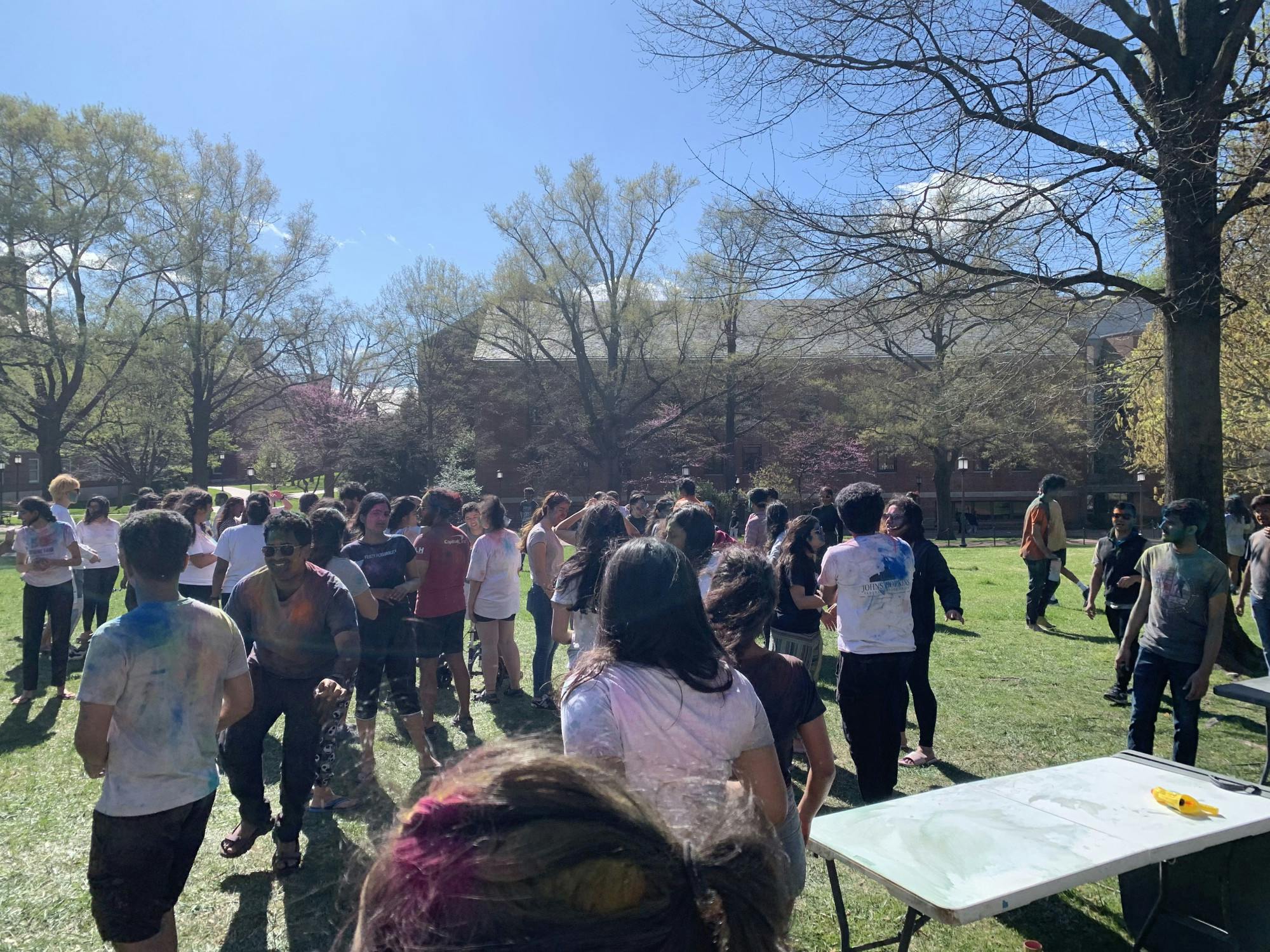 COURTESY OF DHARANI MOORTHY
Bright colored powders fill the air during Holi celebrations, marking the arrival of spring.