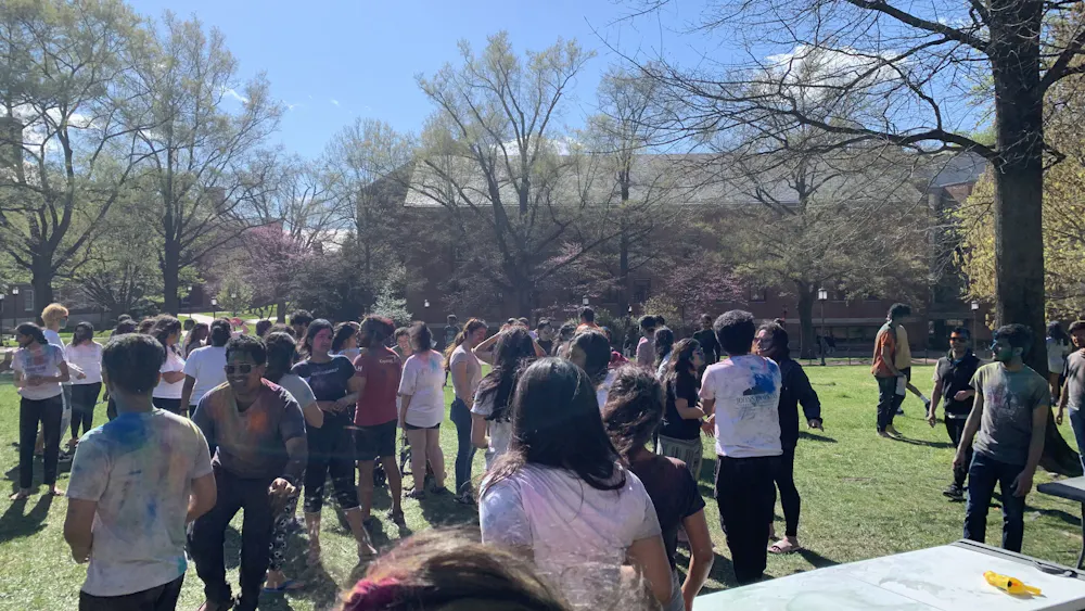 COURTESY OF DHARANI MOORTHY
Bright colored powders fill the air during Holi celebrations, marking the arrival of spring.