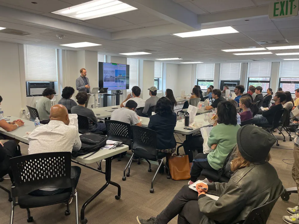 COURTESY OF LEO QI
Mac McComas led the conversation on economic development and urban pollution in Baltimore City through the lenses of environmental policies.