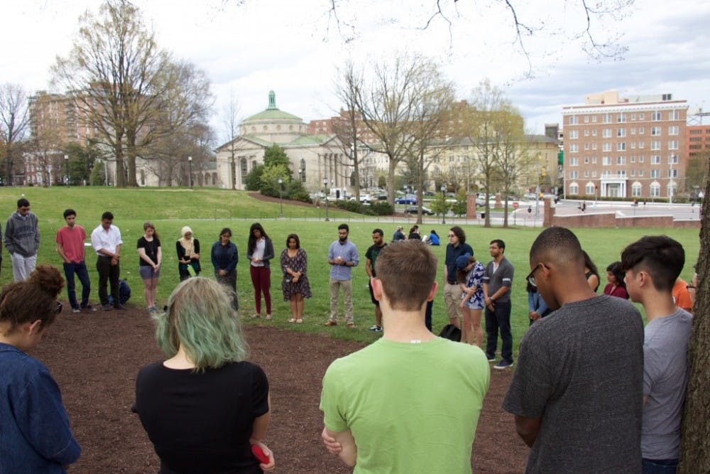  LEON SANTHAKUMAR/PHOTOGRAPHY EDITOR
Students expressed their condolences and held a moment of silence.