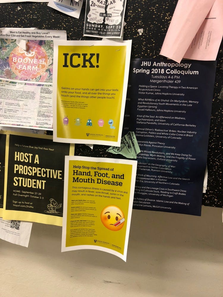 COURTESY OF DAVID GLASS
Flyers posted around campus inform students about Hand, Foot and Mouth Disease.