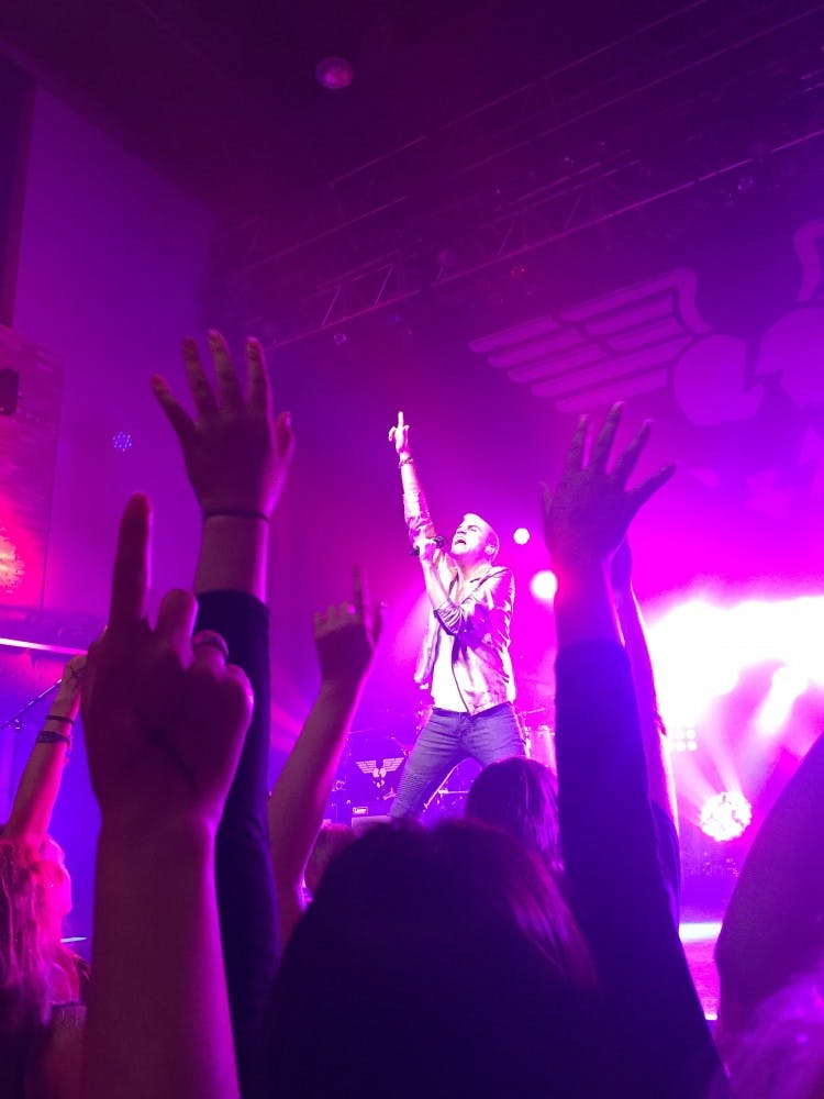 COURTESY OF EMILY HERMAN Neon Trees, led by lead singer Tyler Glenn, brought high energy and intense lights to the Rams Head Live! stage on July 18.