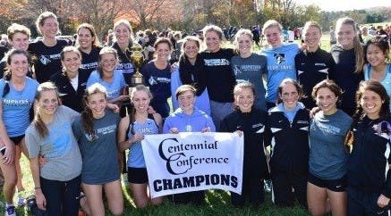  HOPKINSSPORTS.COM
The women’s team celebrates yet another conference championship.
