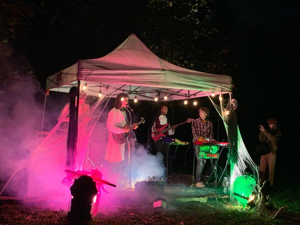 COURTESY OF JULIA ALUMBRO
The Deja Vu Band performs onstage with a spooky setup on Halloween Eve.