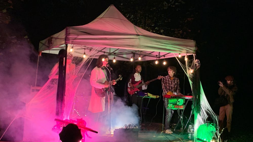 COURTESY OF JULIA ALUMBRO
The Deja Vu Band performs onstage with a spooky setup on Halloween Eve.