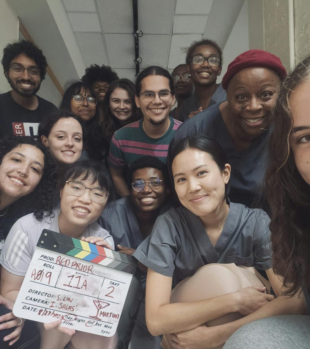 COURTESY OF KAORI TAYLOR
Students and hired actors involved in making Lin’s film Red Prior smile for a group photo while working on the film set.&nbsp;