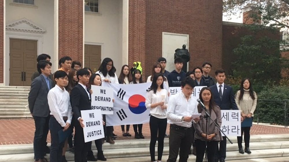 COURTESY OF SHERRY KIM
Korean students and allies demonstrate against President Park.
