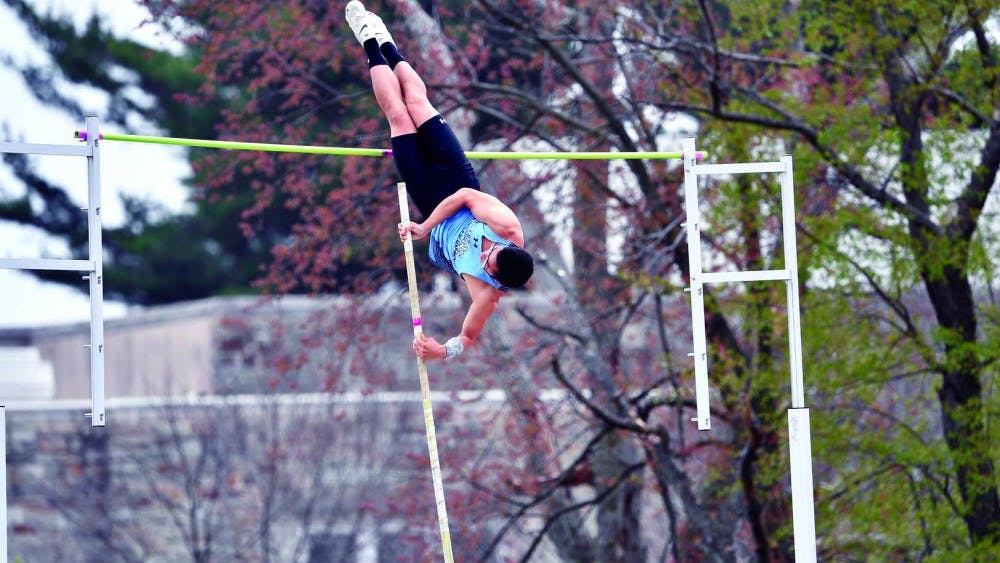 HOPKINSSPORTS.COM
Senior Benjamin Huang took fifth in pole vault with a 4.45-meter vault.