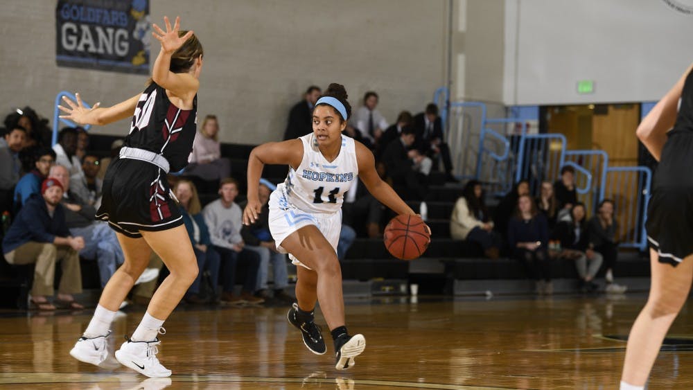 HOPKINSSPORTS.COM
Sophomore forward Elise Moore scored six straight points in the first half.