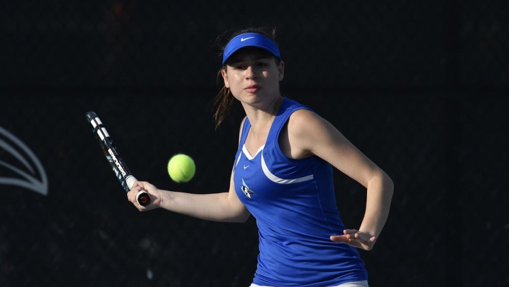 COURTESY OF HOPKINSSPORTS.COM

Junior Chrissy Simon helped earn the women's tennis team's victory over the Dickinson Red Devils with her impressive doubles performance.