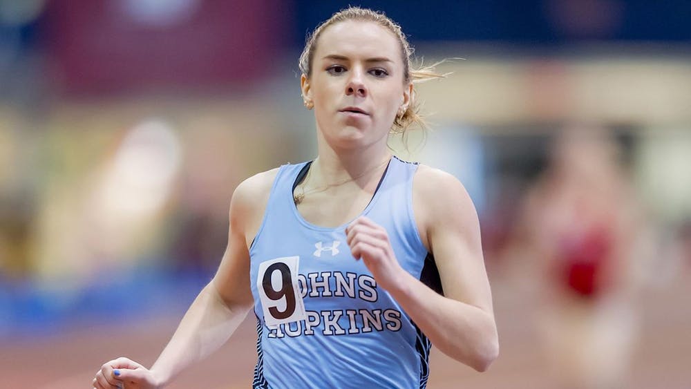 COURTESY OF HOPKINSSPORTS.COM
Senior Therese Olshanski finished within the top 10 in the 1,500-meter race.