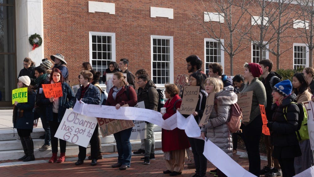 Activists gathered on the steps of MSE Library where they shared their experiences reporting sexual misconduct and assault to the Office of Institutional Equity.