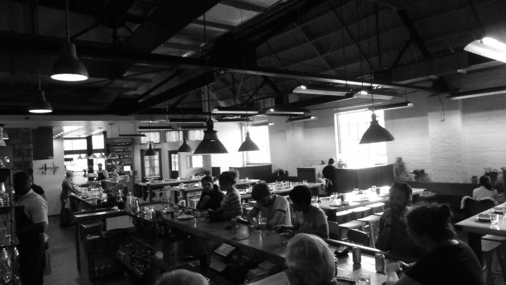 A. CURRELL /CC-BY-NC 2.0
The dining room of Remington’s Parts & Labor is bustling and lively but does not feel over-crowded. 