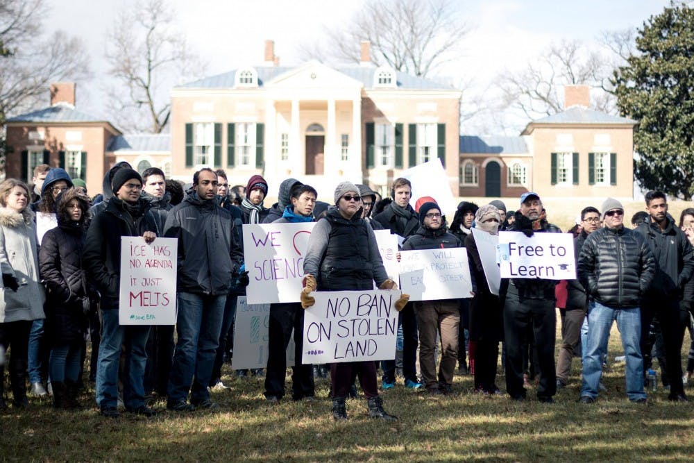 COURTESY OF JOHNS HOPKINS PHOTOGRAPHY FORUM
Members of the Hopkins community gathered in freezing weather to express solidarity with those stranded by Trump’s executive order.