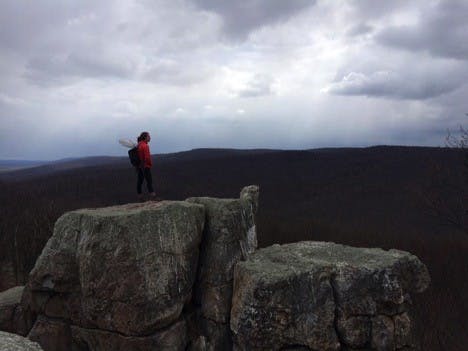 Courtsey of chelsea Spitzer-Morton
The author stands on Chimney Rock at Catoctin Mountain Park in Thurmont, Maryland, about an hour and a half from the Homewood campus.