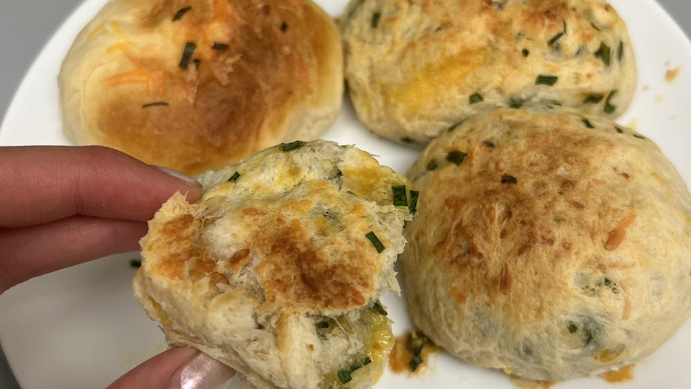 COURTESY OF KAYLA RABEY
Rabey walks through her recipe for cheesy chive biscuits, a family favorite that brings her joy while she's away.